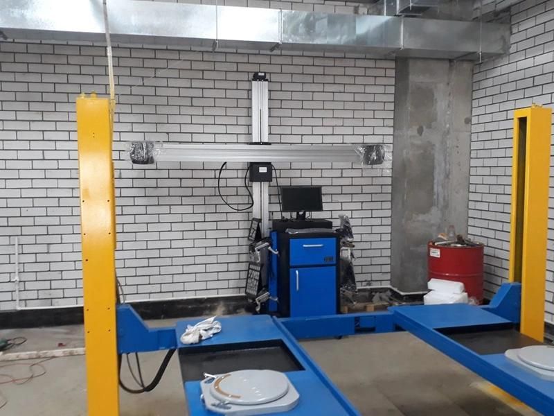 Automatic Wheel Alignment Machines in Car Workshop